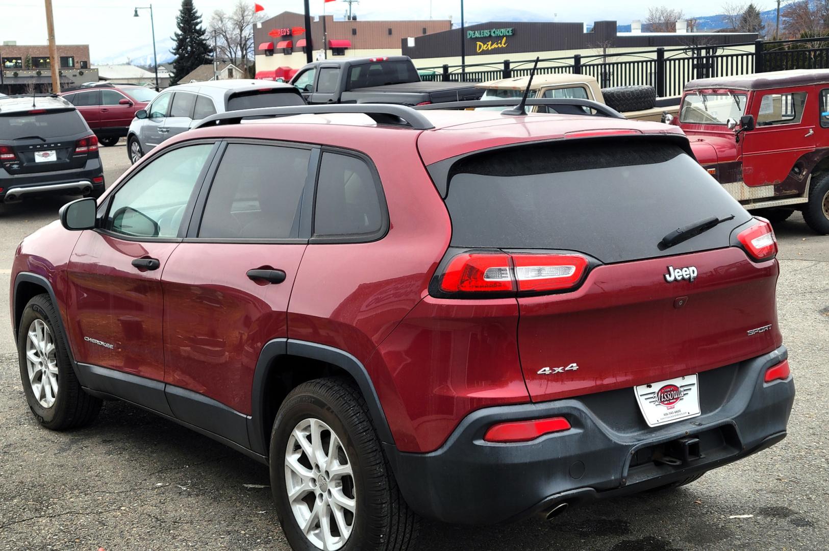 2016 Maroon /Tan Jeep Cherokee Sport (1C4PJMAB9GW) with an 2.4L I4 engine, 9 Speed Automatic transmission, located at 450 N Russell, Missoula, MT, 59801, (406) 543-6600, 46.874496, -114.017433 - Clean 4 Wheel Drive SUV. Air. Cruise. Tilt. Power Windows and Locks. Bluetooth. Backup Camera. - Photo#2